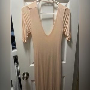 Fitted Blush dress with open back new with tags